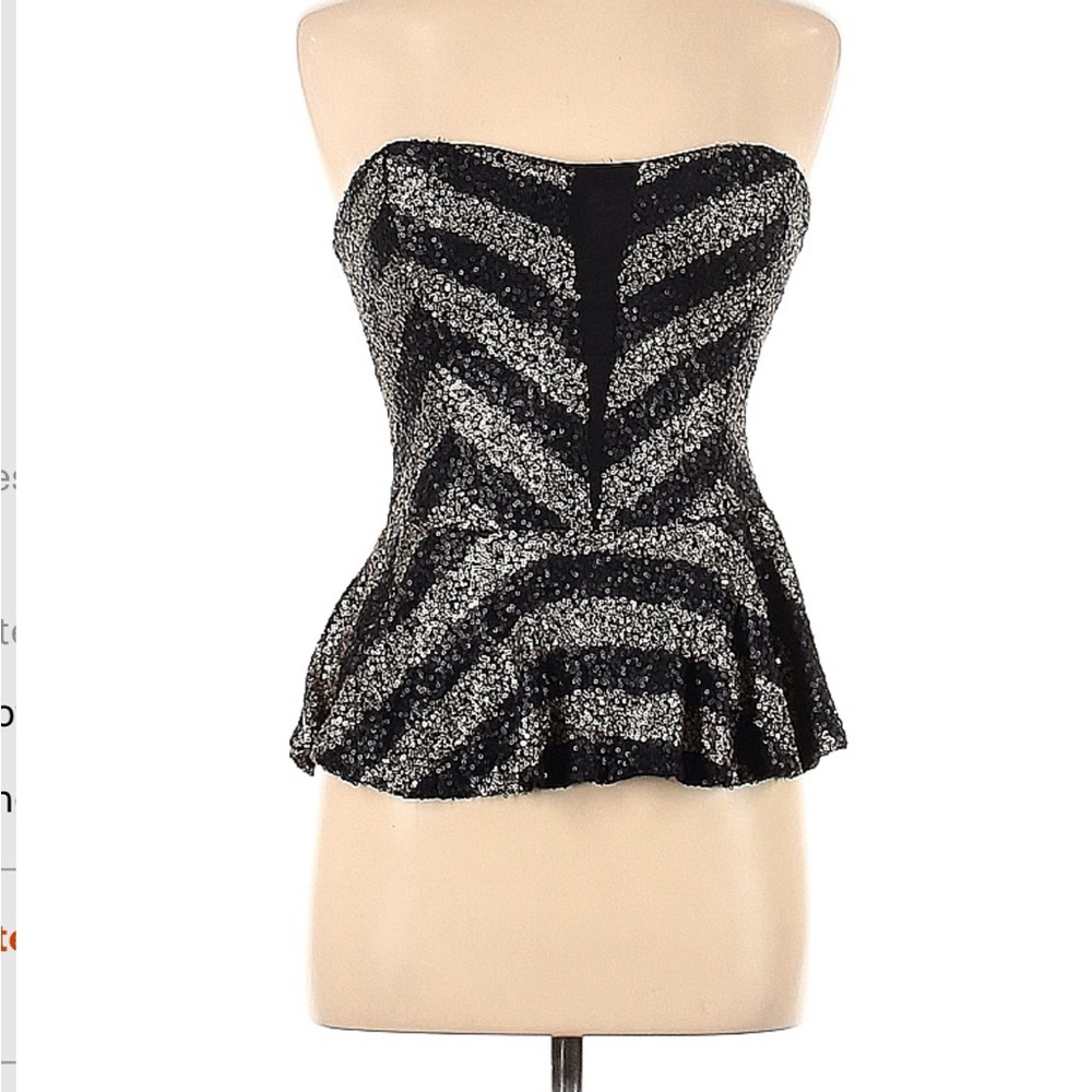 Black and silver rhinestone peplum top. Sleeveless sweetheart neckline